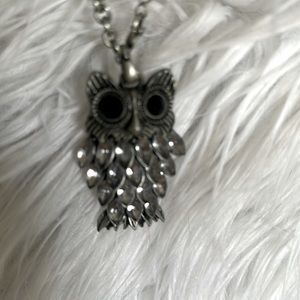 Gorgeous owl, necklace with gray stone, body and black stone eyes on a metal